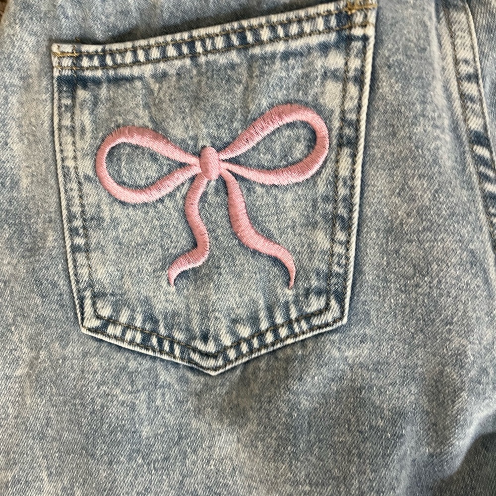 SHEIN Light Blue Jeans with Pink Bow Detail